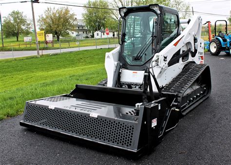 ratchet rake skid steer|best skid steer power rake.